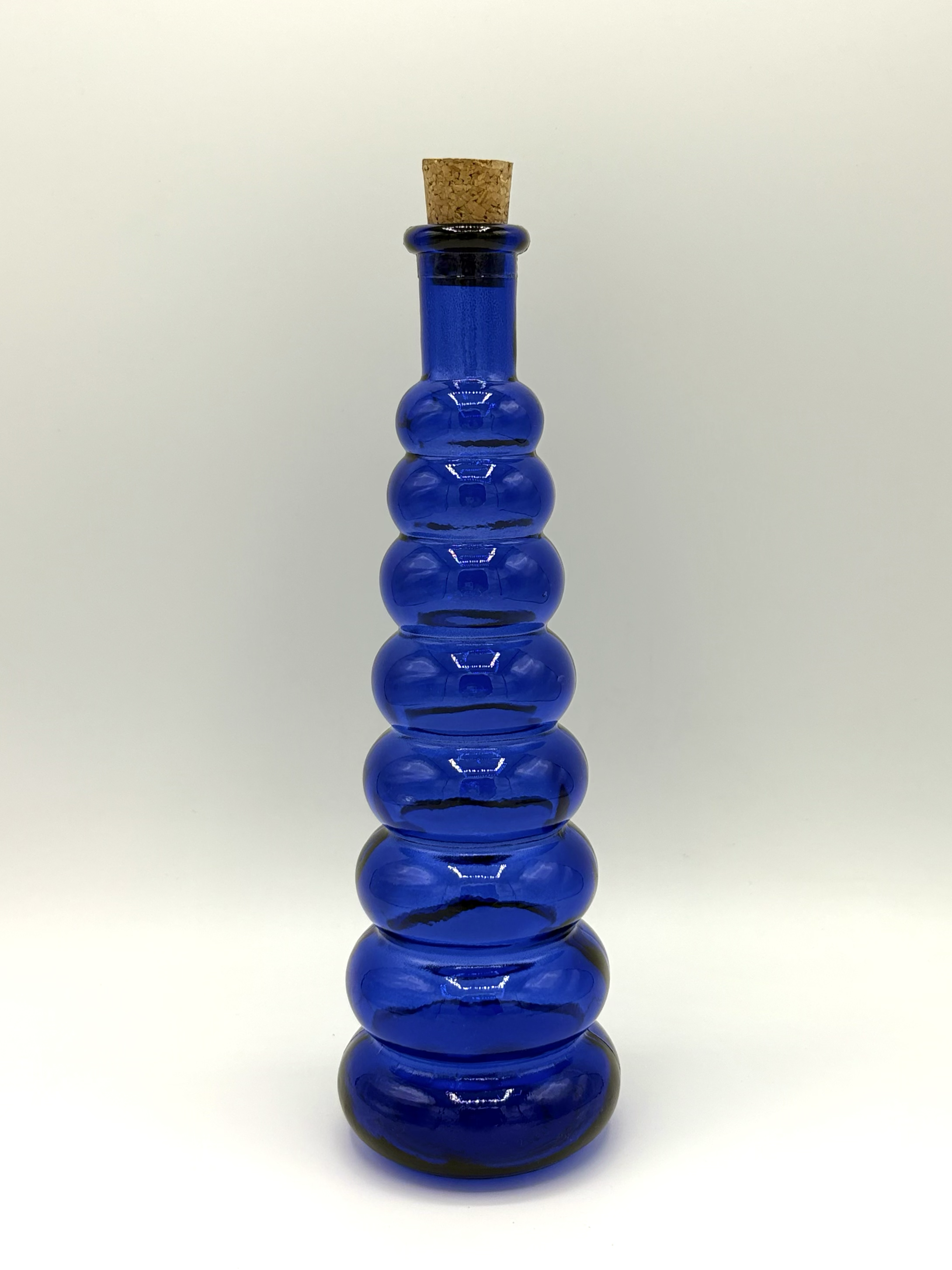 bouteille_8_anneaux_bleu_5314